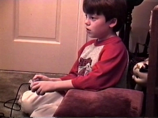 Me playing with my SNES on Christmas Day, 1992